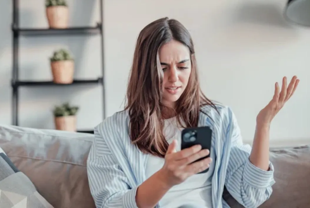 Person frustrated with phone