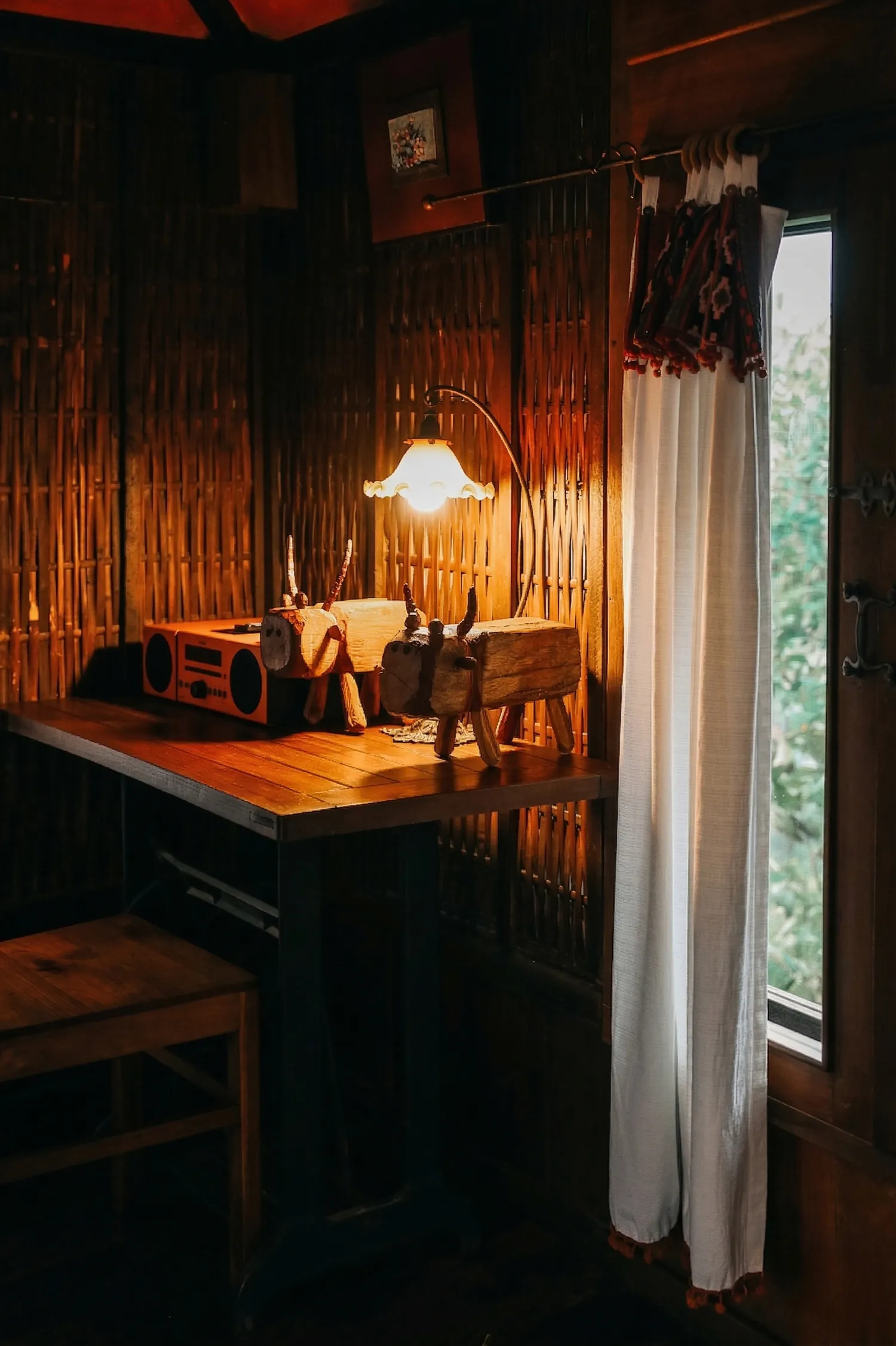 Cabin exterior bathed in warm light